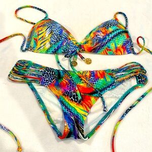 Luli fama colorful swim suit